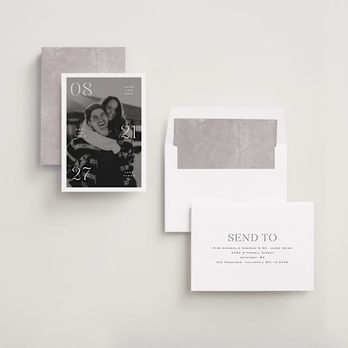 This is a classic save the date with standard by Olivia Kanaley Inman called elements printing on recycled smooth signature in standard