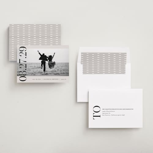 This is a ivory save the date with standard by Pixel and Hank called all stacked up printing on recycled smooth signature in standard