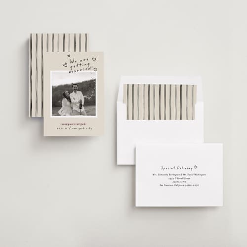 This is a nero save the date with standard by Pati Cascino called surprise! printing on recycled smooth signature in standard