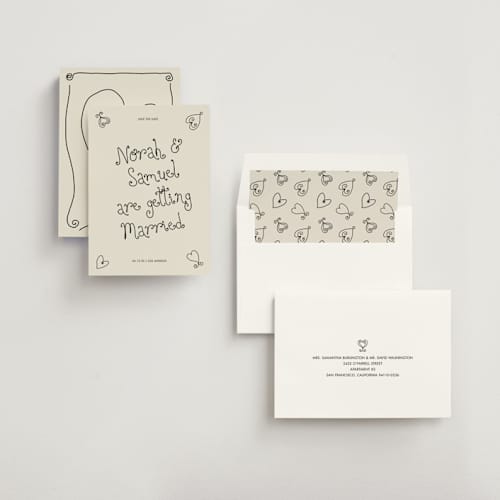 This is a ink save the date with standard by Kelly Watkins called hand-drawn hearts printing on signature in standard