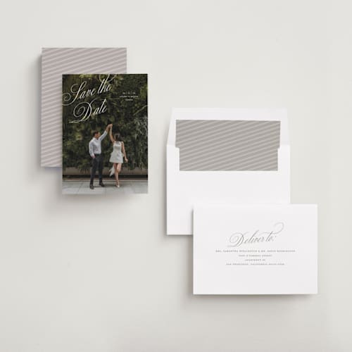 This is a pearl save the date with standard by Pixel and Hank called enamored printing on recycled smooth signature in standard