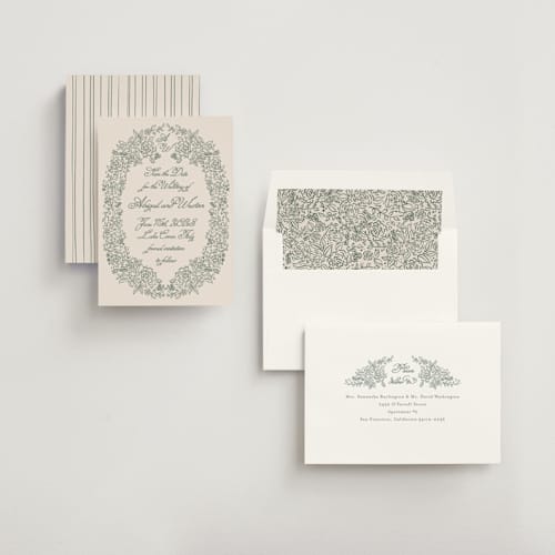 This is a moss save the date with standard by Tamara Hilje called crest florale printing on signature in standard