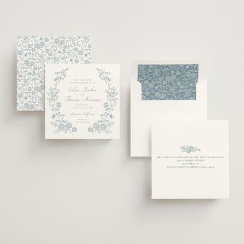 This is a cornflower save the date with standard by Hannah Bowman called toile frame printing on signature in square