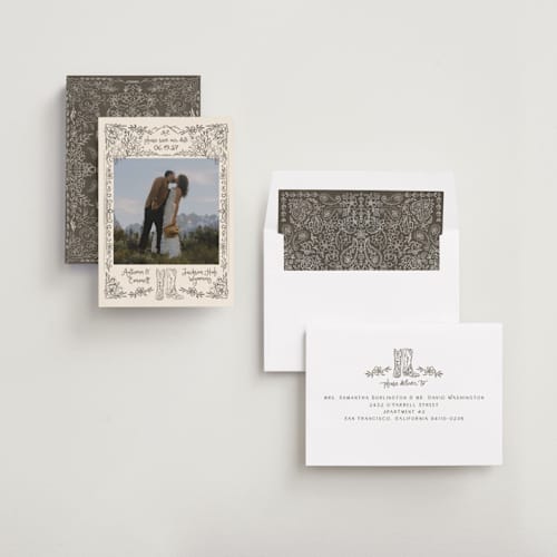 This is a leather save the date with standard by Jenna Holcomb called jackson hole printing on recycled smooth signature in standard