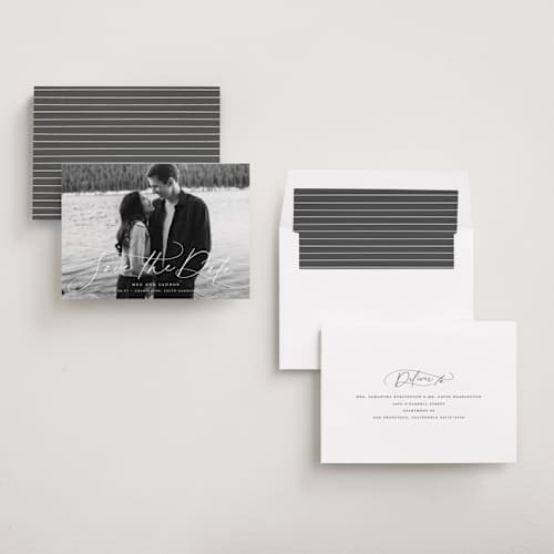 This is a snowfall save the date with standard by Lauren Chism called subtle rise printing on recycled smooth signature in standard