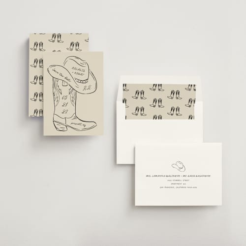 This is a sand save the date with standard by Jelena Vuletic called lariat printing on signature in standard