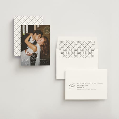 This is a pearl save the date with standard by Leah Bisch called scripted date printing on recycled smooth signature in standard