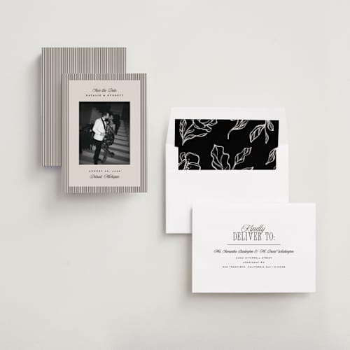 This is a noir save the date with standard by Pixel and Hank called linea printing on recycled smooth signature in standard