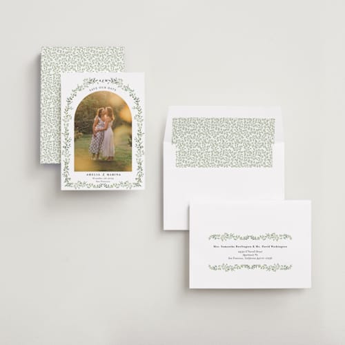 This is a mojito save the date with standard by Susan Moyal called monogramed arch printing on recycled smooth signature in standard