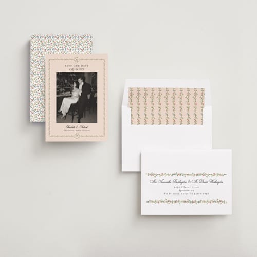 This is a blush save the date with standard by Susan Moyal called monogramed printing on recycled smooth signature in standard