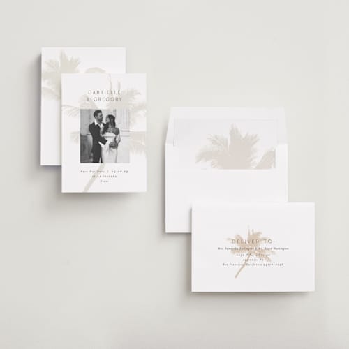 This is a ecru save the date with standard by AK Graphics called palm printing on recycled smooth signature in standard