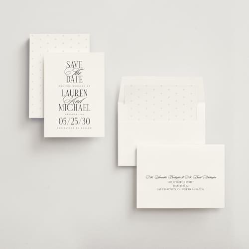 This is a obsidian save the date with standard by Jennifer Postorino called stacked type printing on signature in standard