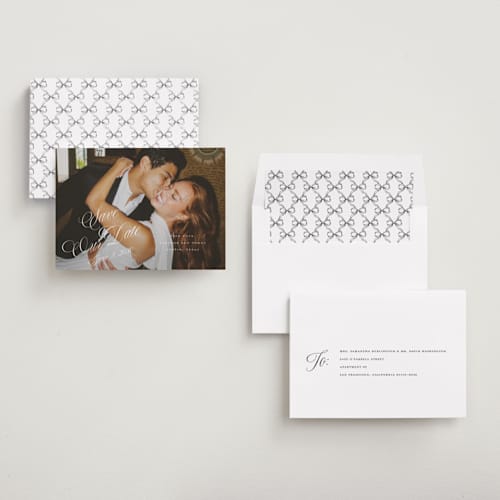 This is a pearl save the date with standard by Leah Bisch called scripted date printing on recycled smooth signature in standard