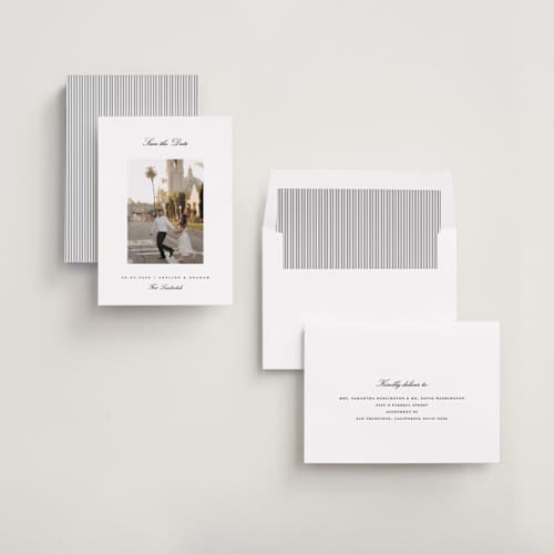 This is a snow save the date with standard by Pixel and Hank called minimal printing on recycled smooth signature in standard