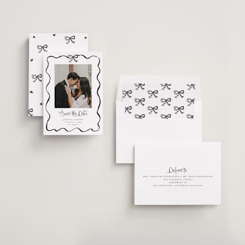This is a ink save the date with standard by Cass Loh called quirky fun printing on recycled smooth signature in standard