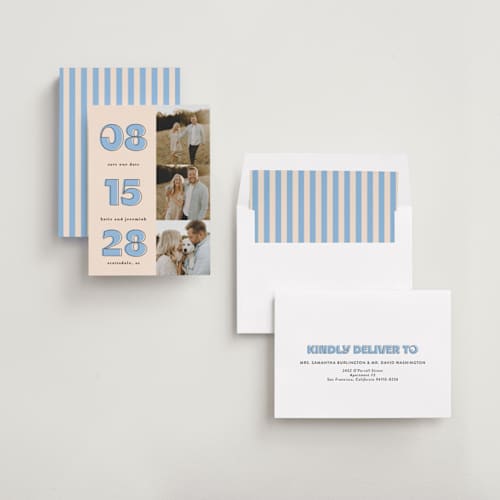 This is a dusty blue save the date with standard by Leah Ragain called outlined date printing on recycled smooth signature in standard