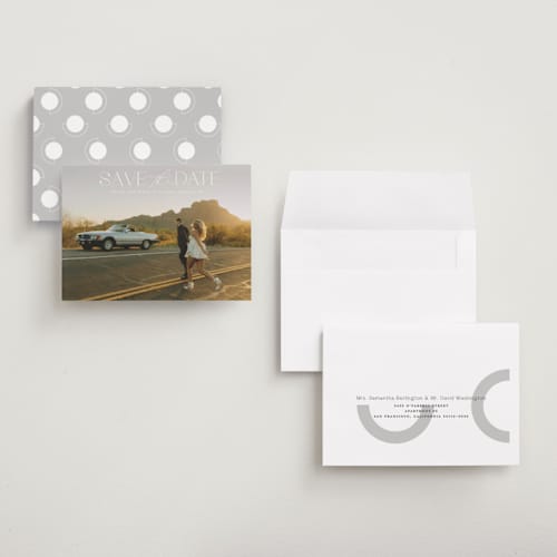 This is a ivory save the date with standard by Maja Cunningham called prose printing on recycled smooth signature in grand