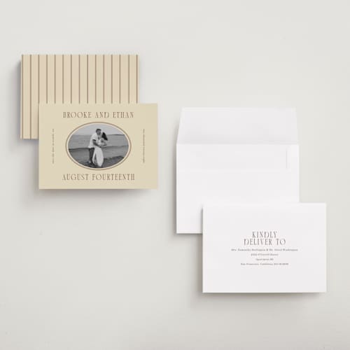 This is a buttercream save the date with standard by Angela Garrick called ethan printing on recycled smooth signature in grand