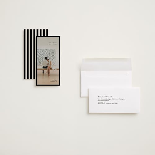 This is a coal save the date with standard by Jackie Crawford called archival border printing on recycled smooth signature in tall