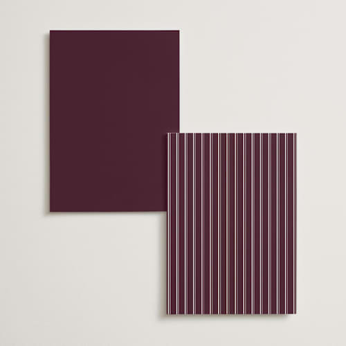 This is a burgundy table numbers with standard by Stacey Meacham called engraved names printing on doublethick in standard