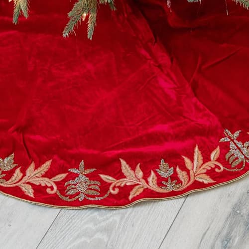 This is a red holiday decorations by Courtney Bedi called standard size red velvet gold embroidered tree skirt christmas holiday gift in standard
