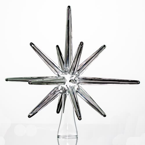 This is a silver holiday decorations by Albrecht Art Glass called platinum glass moravian christmas tree star in standard