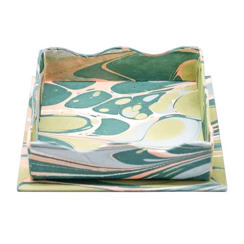 This is a green decorative objects by Inner Child called nesting scalloped hand-marbled trays in green and pink - set of 2 in standard