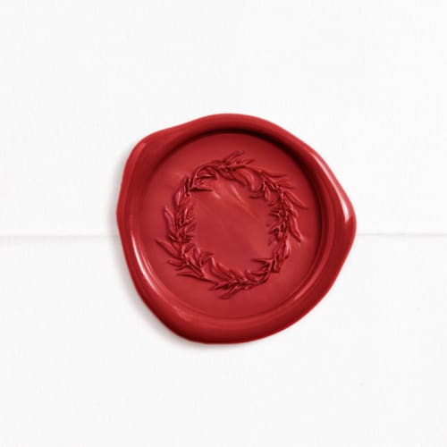 This is a sangria wax seals by Melanie Kosuge called holiday wreath in red (pack of 25) in standard