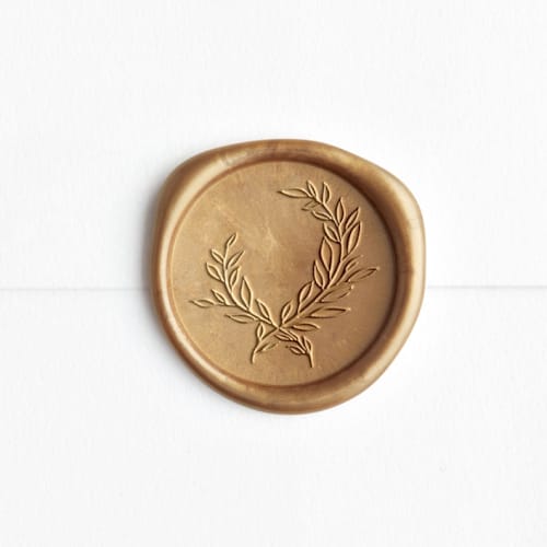 This is a antique gold wax seals by Pink House Press called crest in gold (pack of 25) in standard