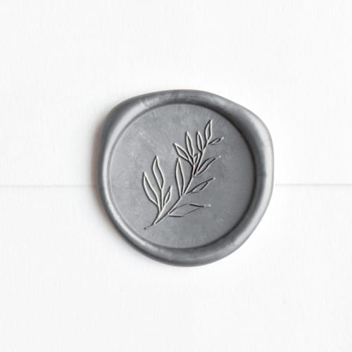 This is a silver wax seals by chocomocacino called sprig in silver (pack of 25) in standard