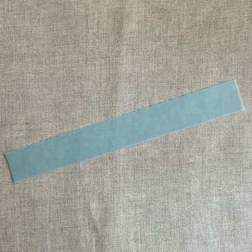 This is a blue belly bands by Ivory Invitations called aqua blue colored translucent vellum belly band for 5x7 inch invitation | pack of 10 in standard