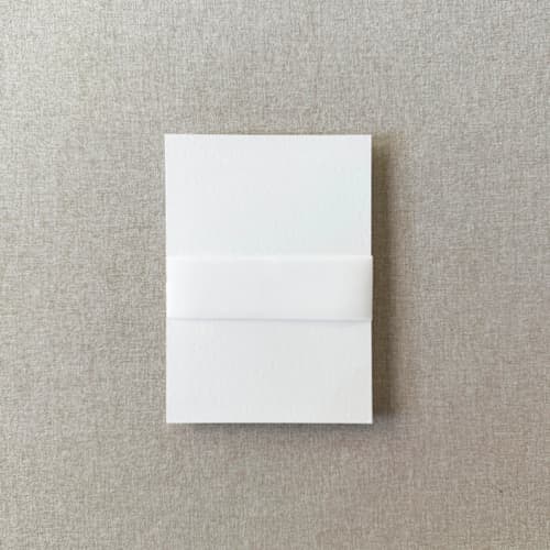 This is a clear belly bands by Cotton and Bow called blank vellum belly band | for 5x7" invitations | set of 10 in standard