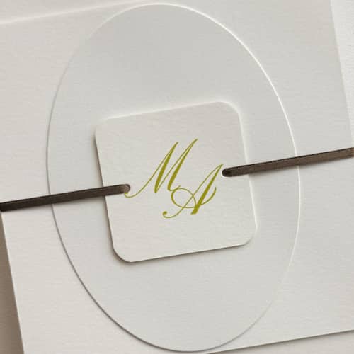 This is a multicolorassorted-colors belly bands by Paper Haven called customizable monogram bellyband tags with ribbon for 5 x 7 invitation | pack of 25 in standard