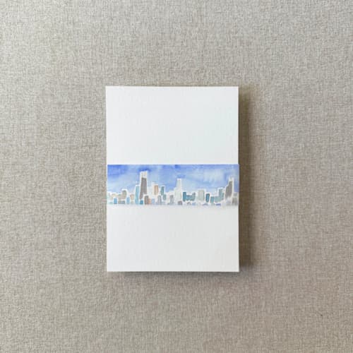 This is a multicolor belly bands by Cotton and Bow called chicago vellum belly band | for 5x7" invitations | set of 10 in standard