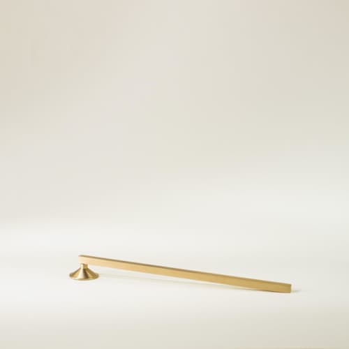 This is a brass wedding decor by Roarcraft called mini brass candle snuffer in standard