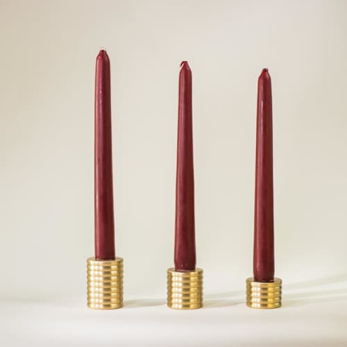 This is a brass wedding decor by Roarcraft called cylinder candlestick - set of 3 in standard