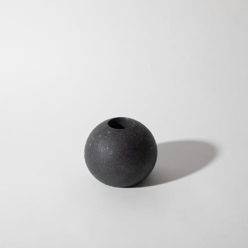 This is a black wedding decor by Pretti.Cool called black terrazzo block candlestick holder, sphere in standard