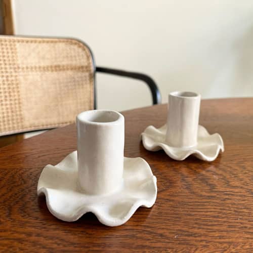 This is a white wedding decor by Sidney Field called ruffled candle holder in standard