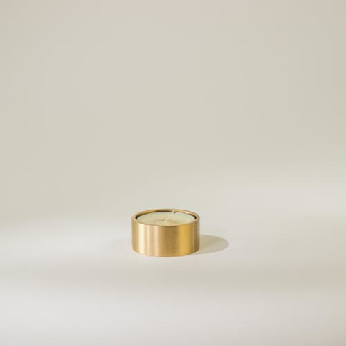 This is a brass wedding decor by Roarcraft called brass tealight holder in standard