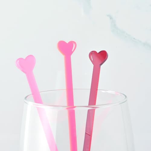 This is a multicolor wedding drinkware by Em and Me Studio called baby heart stir sticks, set of 6 in standard
