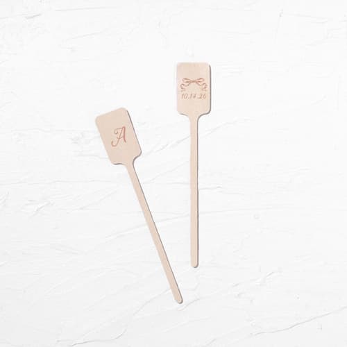 This is a natural wedding drinkware by ForYourParty called bow-tied date stir stick, wooden stir stick, set of 100 in standard