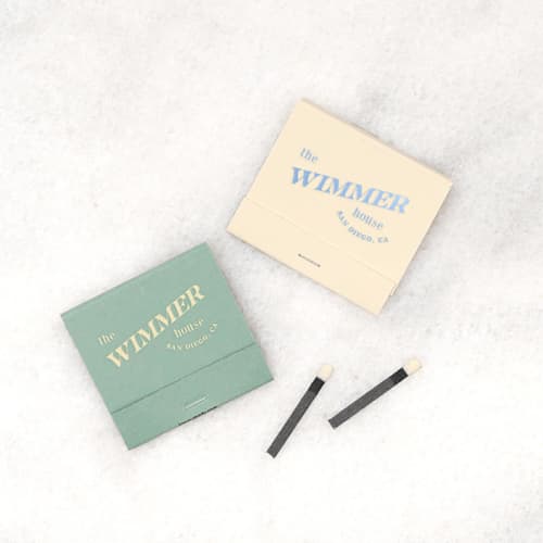This is a green matchbooks by ForYourParty called bold family name house matchbooks, set of 50 in standard