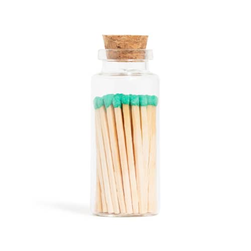 This is a green matchbooks by Summer Hedglin called green matchsticks in medium corked vial in standard