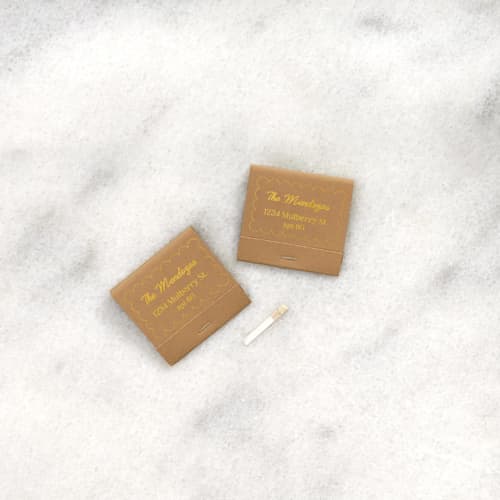 This is a brown matchbooks by ForYourParty called scalloped hearth address matchbooks, set of 50 in standard