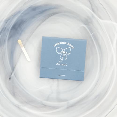 This is a blue matchbooks by ForYourParty called ribbon welcome baby matchbook, set of 50 in standard