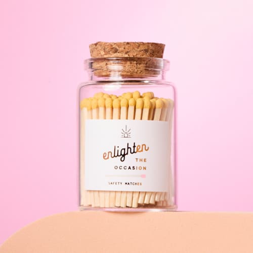 This is a multicolorassorted-colors matchbooks by Summer Hedglin called lux mini match corked vial with yellow matchsticks in standard