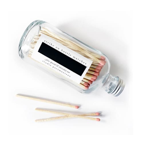 This is a pink matchbooks by Jessica Cunningham called 4" blush pink candle match jar | classic interior decor in standard