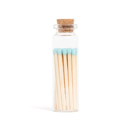 This is a blue matchbooks by Summer Hedglin called baby blue matchsticks in small corked vial in standard