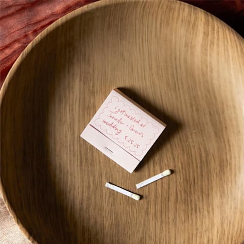 This is a silver matchbooks by ForYourParty called custom kitschy cocktail hour wasted love matchbooks, set of 100 in standard
