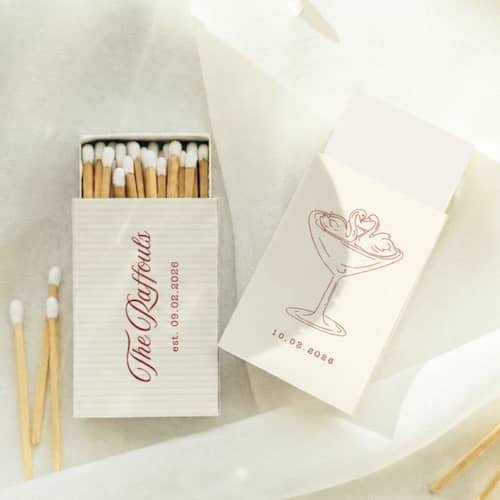 This is a multicolorassorted-colors matchbooks by Paper Haven called swan martini glass customizable matchboxes | set of 50 in standard